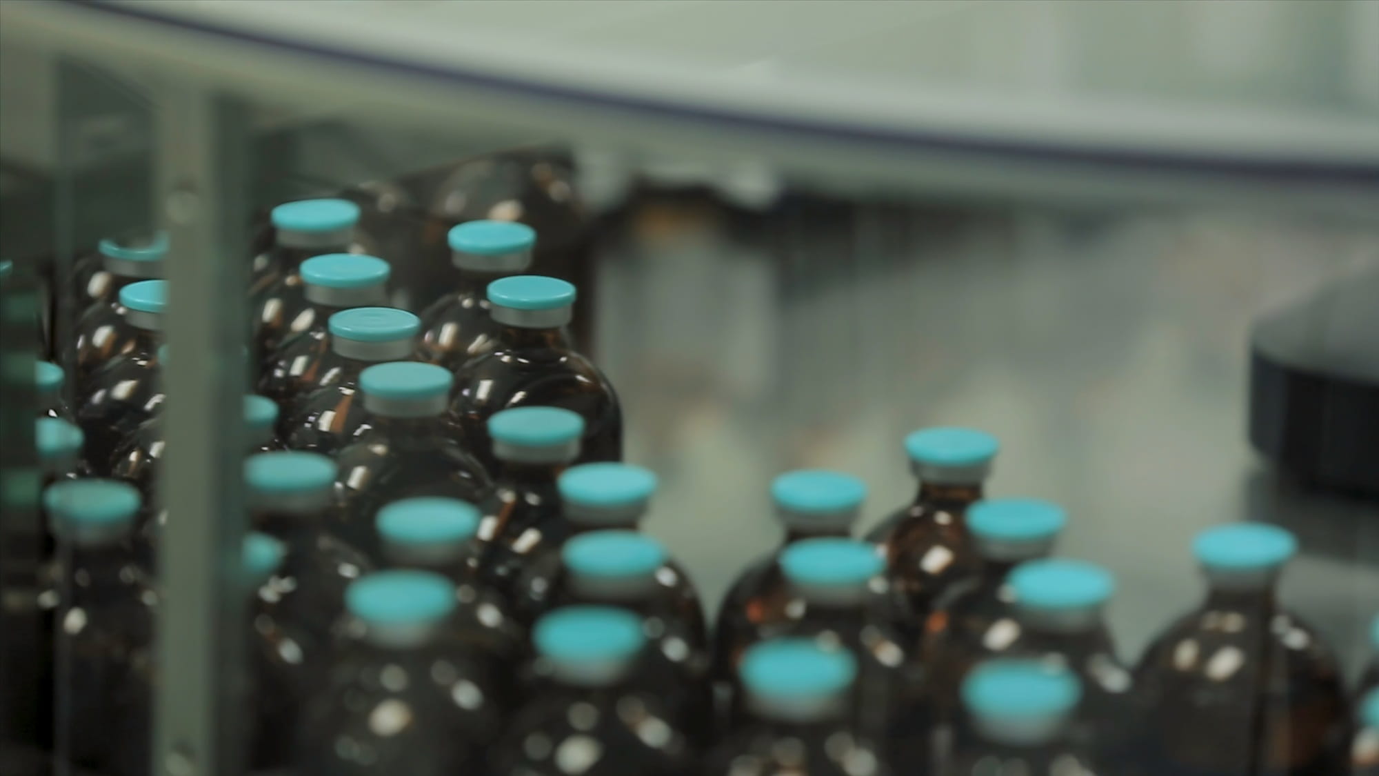 Pharmaceutical industry. Production line machine conveyor at factory with bottles. pharmaceutical